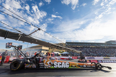 Racecar in a Race Track