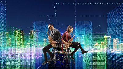 People Sitting on Stools Playing Guitar