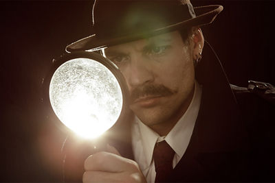 Detective with a Magnifying Glass