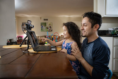 Parent and Child Using EOS Webcam Utility with Canon Camera