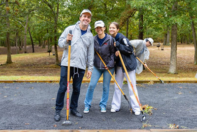 Canon Employees Cleaning the Woods