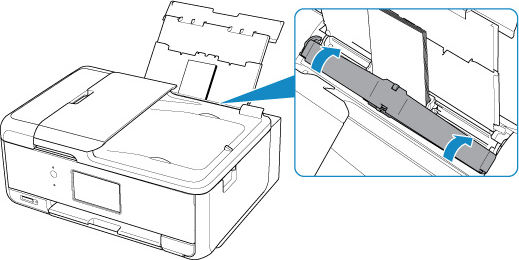 Gently close the feed slot cover