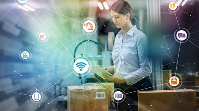 Image of a woman checking in boxes