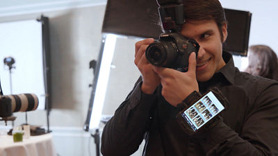 Photorgapher taking pictures in studio