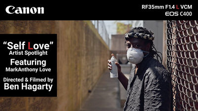 Person Holding Spray Paint Can