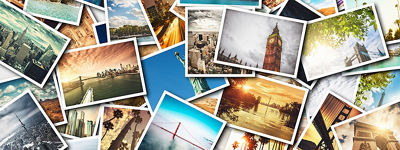 Pile of photographs showing places around the world