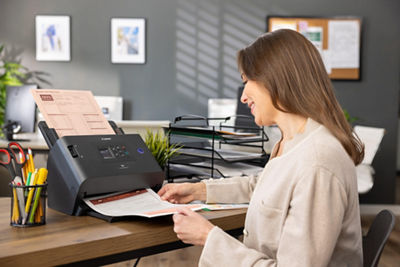 Woman Using Canon Scanner