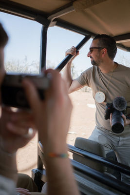 Lindsey Posing in a Doorless Trolley