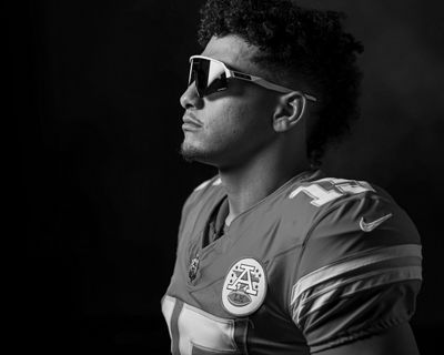 Football Player Posing with Sunglasses