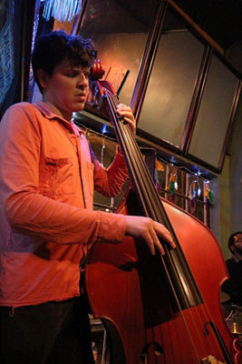 A musician holding a Cello