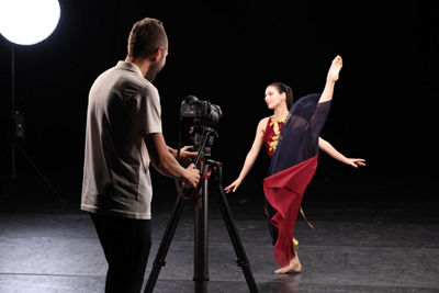 Person Taking Picture of Perfomer