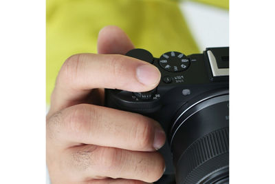 Person Holding EOS R50 V
