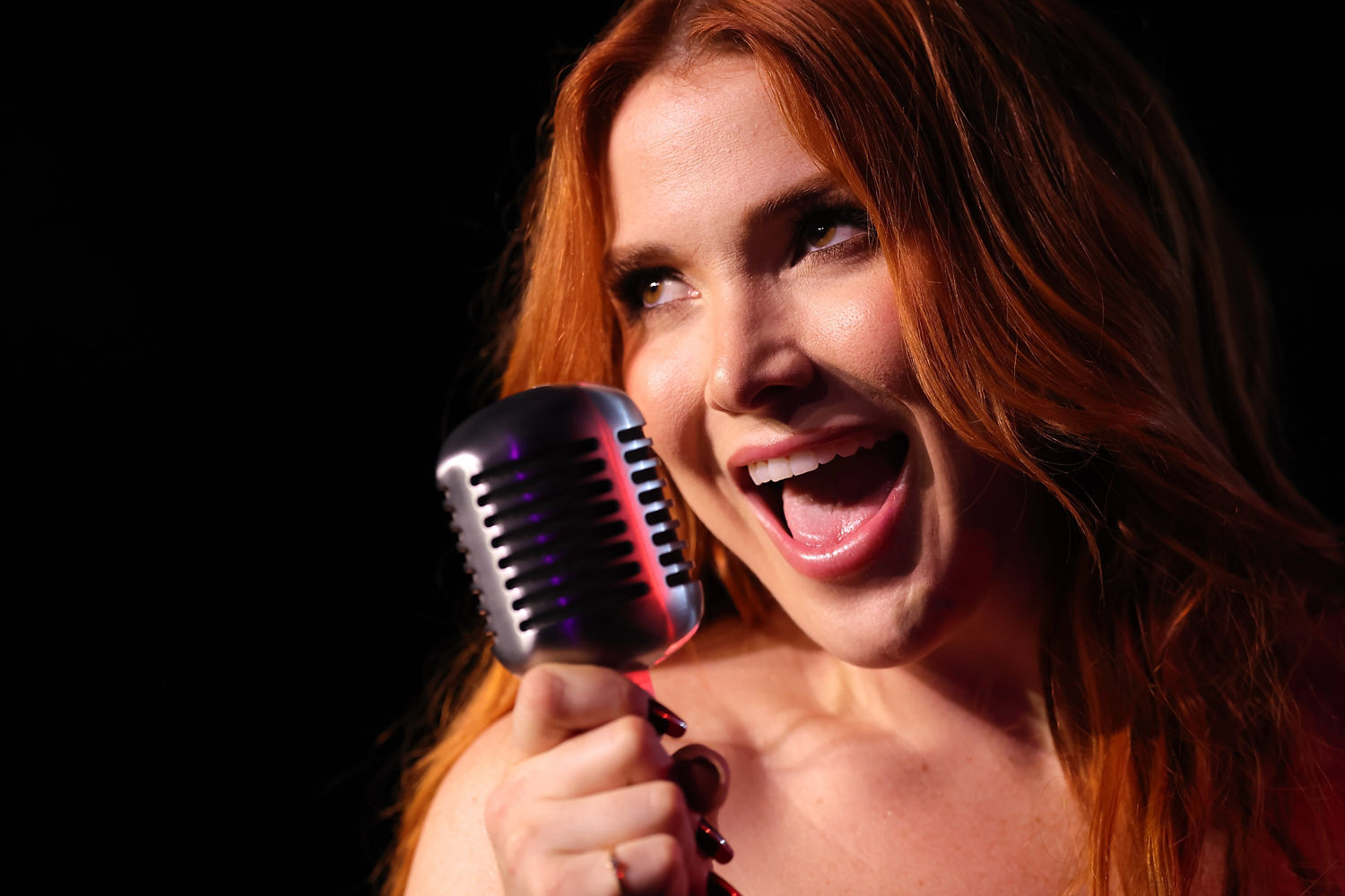 Singer Holding a Mic