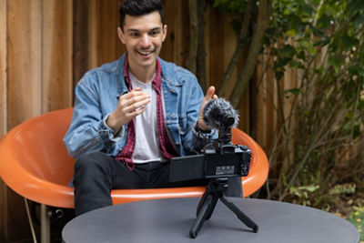 Man looking at EOS M50 Mark II Content Creator Kit  