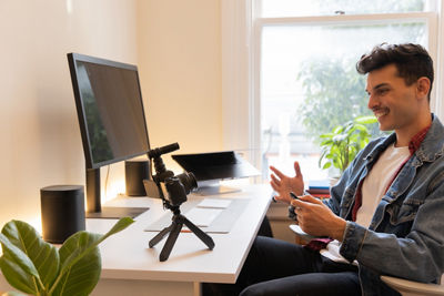 Man holding remote control