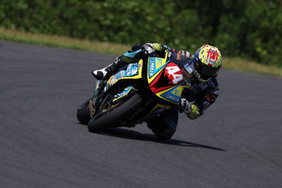 Racing Motorcycle Making a Turn