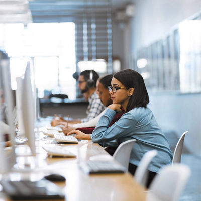 Image of a woman working on a computer