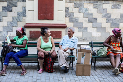 People sitting on a bench