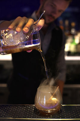Bartender pouring drink