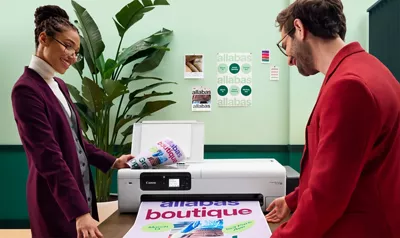 People Printing a Poster