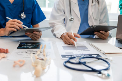 Doctors Reviewing Medical Documents