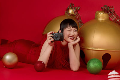 Person Next to Giant Jingle Bells