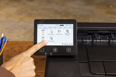 Person Using Keypad on imageCLASS LBP247dw II