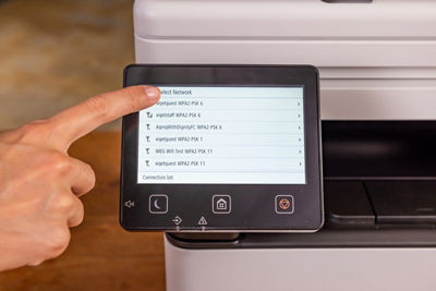 Person Using Touchscreen on imageCLASS LBP674Cdw II