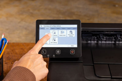 Person Using Touchscreen on imageCLASS LBP674Cdw II
