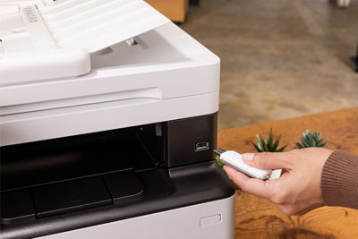 Person Inserting USB to imageCLASS MF462dw II