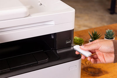Person Inserting USB to imageCLASS MF465dw II