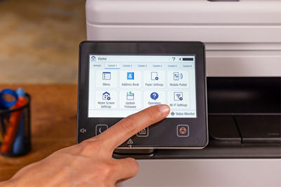 Person Using Touchscreen on imageCLASS MF665Cdw