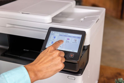 Person Using the Touchscreen on imageCLASS MF751Cdw II