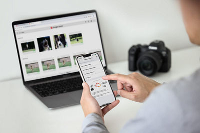 Person Holding a EOS R6 Mark II with Flash