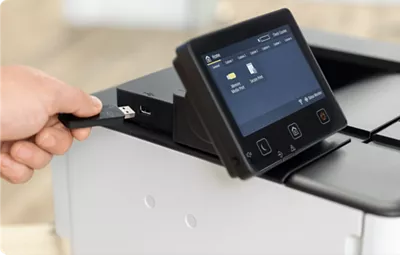 imageCLASS LBP247dw - Person Plugging in a USB Flash Drive