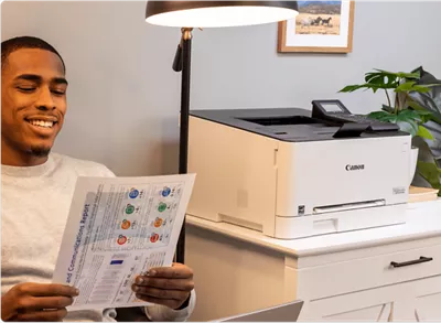 imageCLASS LBP632Cdw - Person Printing Flyer