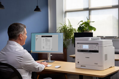 imageCLASS MF287dw - Person Using PC to Print