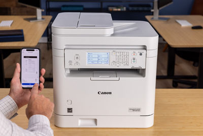 imageCLASS MF287dw - Person Using Phone to Print