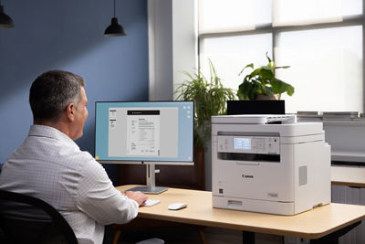 imageCLASS MF289dw - Person Using PC to Print