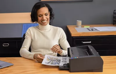 imageFORMULA DR-M1060II - Person Scanning Document