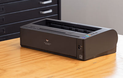 imageFORMULA DR-M1060II - Person Scanning Document