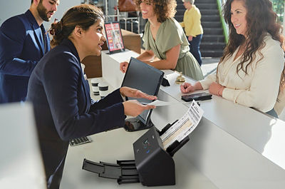 imageFORMULA DR-S250N - Help Desk Worker Helping Person