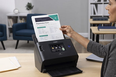 imageFORMULA DR-S350NW - Person Scanning Document