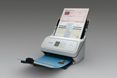 Scanner with Papers in Feeder