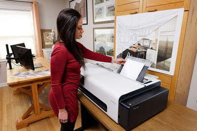 Person Getting Printed Poster from the imagePROGRAF TC-21