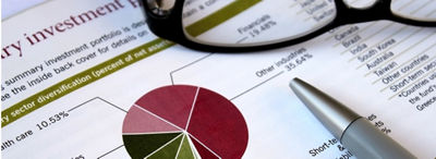 Pie Chart on paper with pen