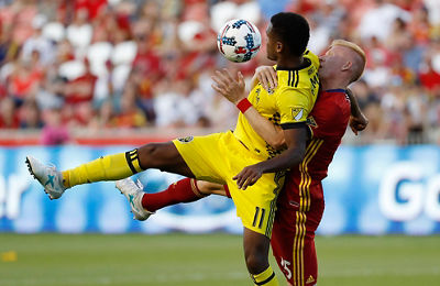 Soccer action shot - two opposing members colliding on the field image