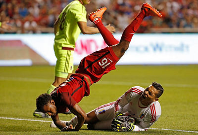 Soccer player bracing impact