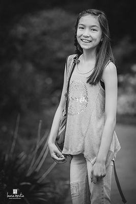 Child in a Dress with a Backpack