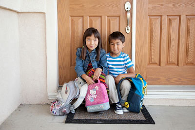 Siblings Sitting Next to Each Other